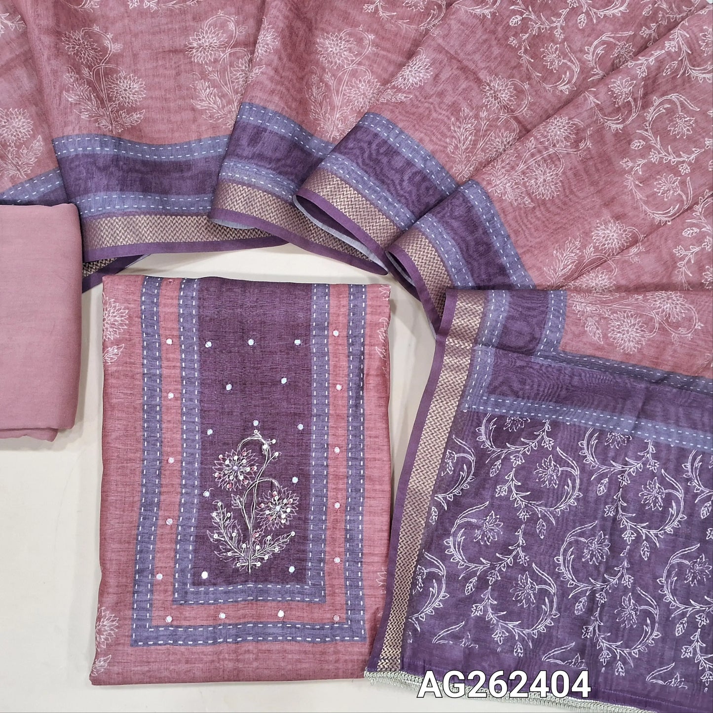 Designer pink and purple jute silk floral printed unstitched salwar material, zardozi work on yoke (Textured, Lining Needed) matching spun cotton bottom,  digital printed dual shaded jute silk dupatta. AG262404