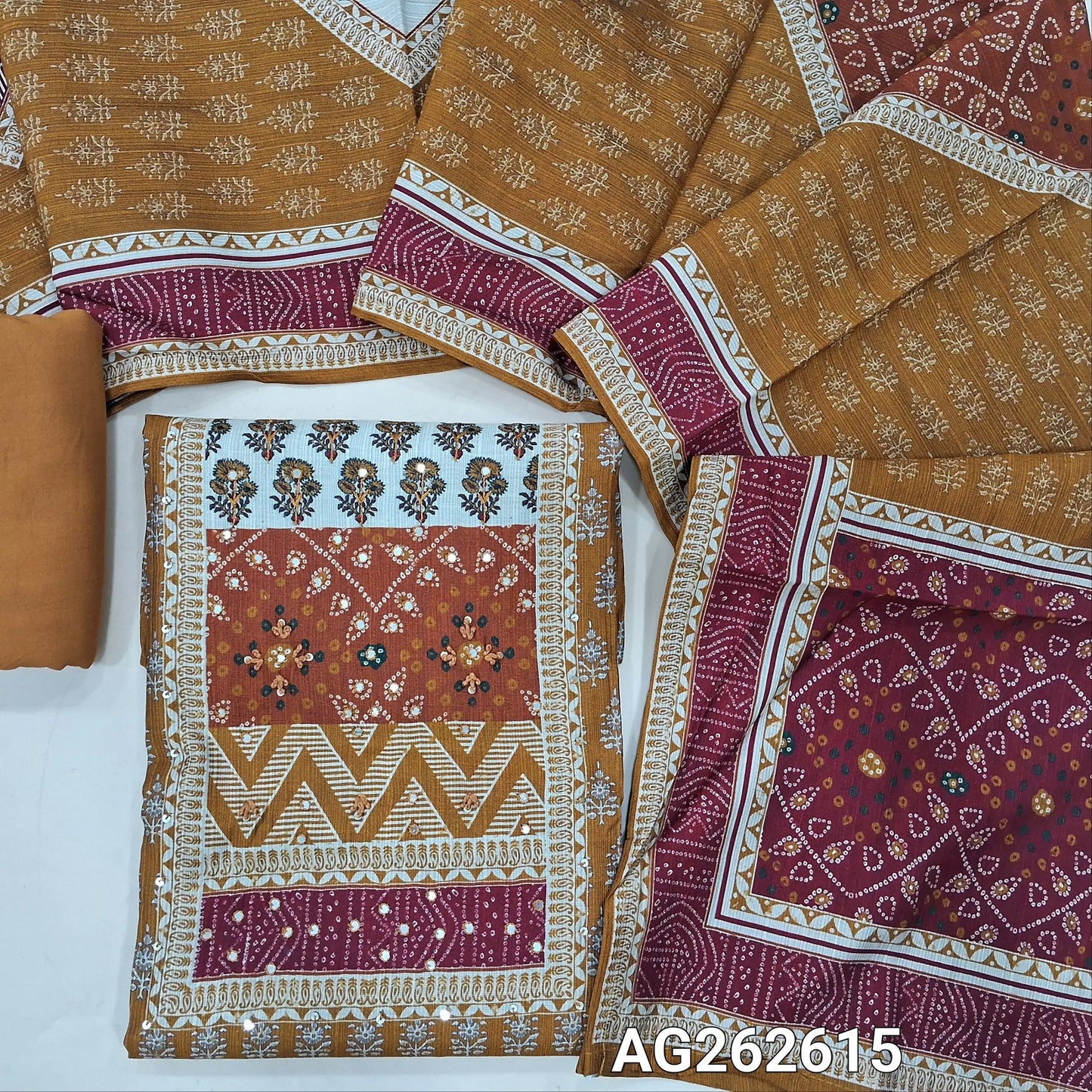 Mehandhi Yellow and Maroon accord linen digital printed unstitched salwar material, hand embroidery and faux mirror work on yoke (Textured, Soft, Lining Optional) matching spun cotton bottom, digital printed accord linen short width dupatta. AG262615