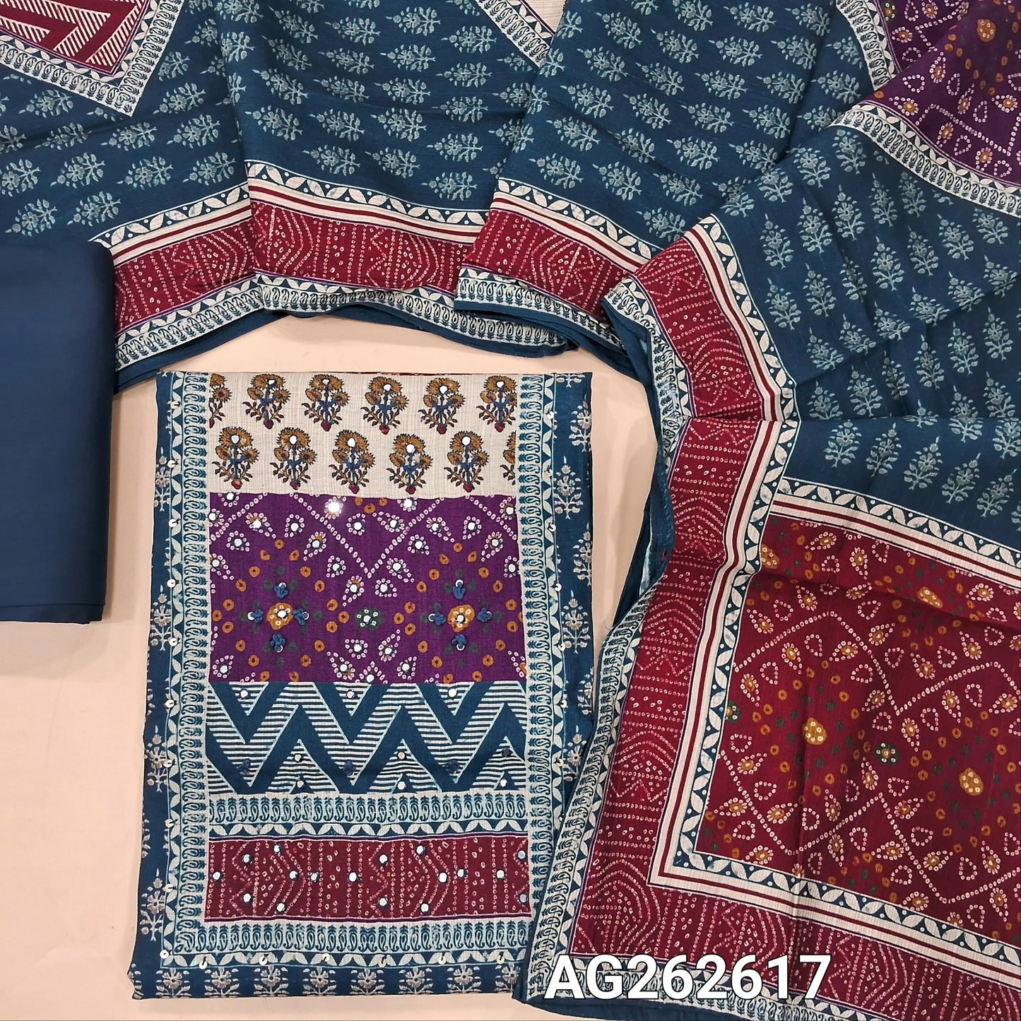 Dark Teal Blue and Maroon accord linen digital printed unstitched salwar material, hand embroidery and faux mirror work on yoke (Textured, Soft, Lining Optional) matching spun cotton bottom, digital printed accord linen short width dupatta. AG262617