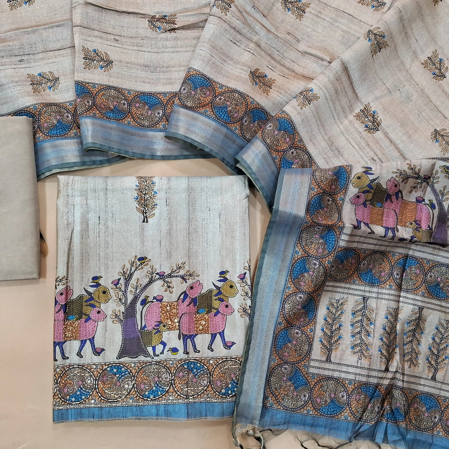Light Grey premium tussar silk unstitched salwar material with madhubani prints all over with hand embroidery work (Lightweight, Lining Needed) Matching Santoon Bottom, Tussar silk digital printed dupatta. AG262707