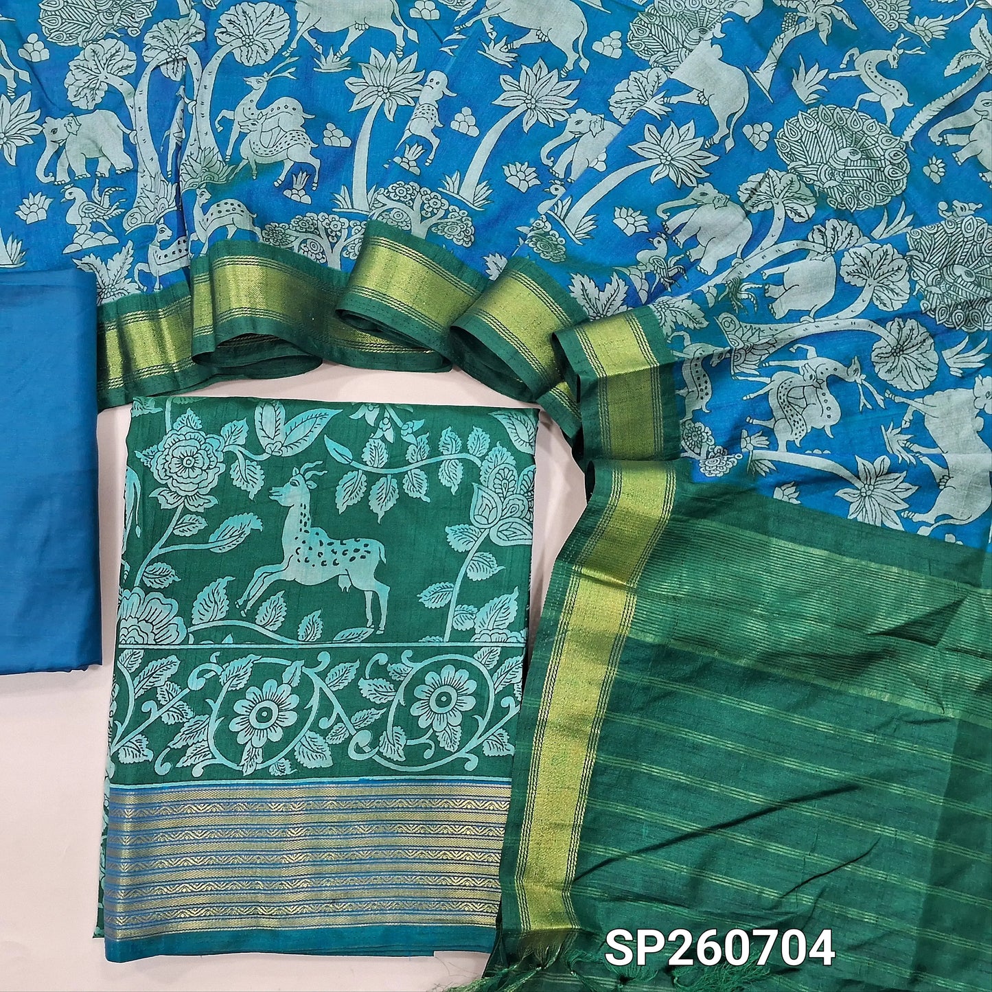Emerald green and turqoise blue digital printed premium silk unstitched salwar material, zari woven daman borders(lining needed)matching silky bottom, digital printed premium silk dupatta. SP260704