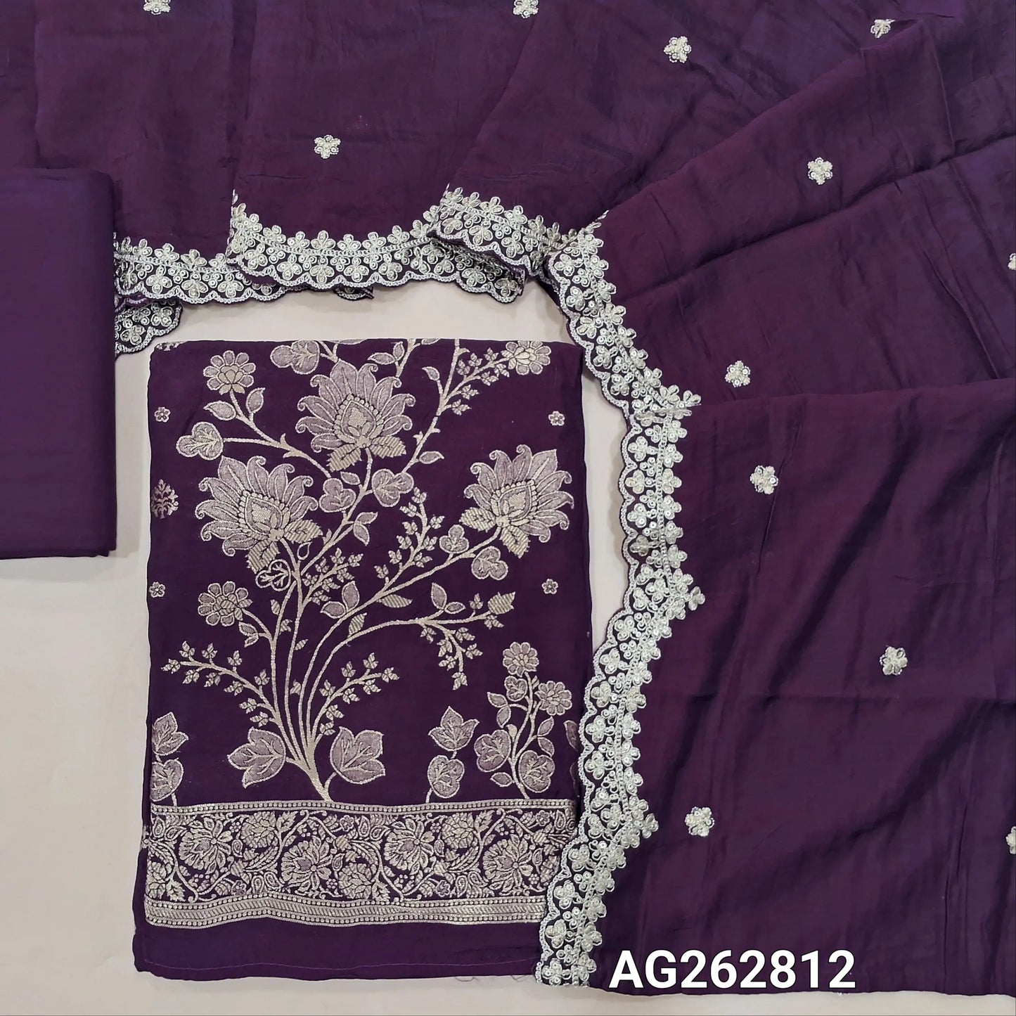 Dark Purple premium russian silk unstitched salwar material with rich benarasi zari weaving all over (Soft, Lining Needed) Matching spun cotton bottom, zari woven soft silk cotton dupatta with scallop edges. AG262812