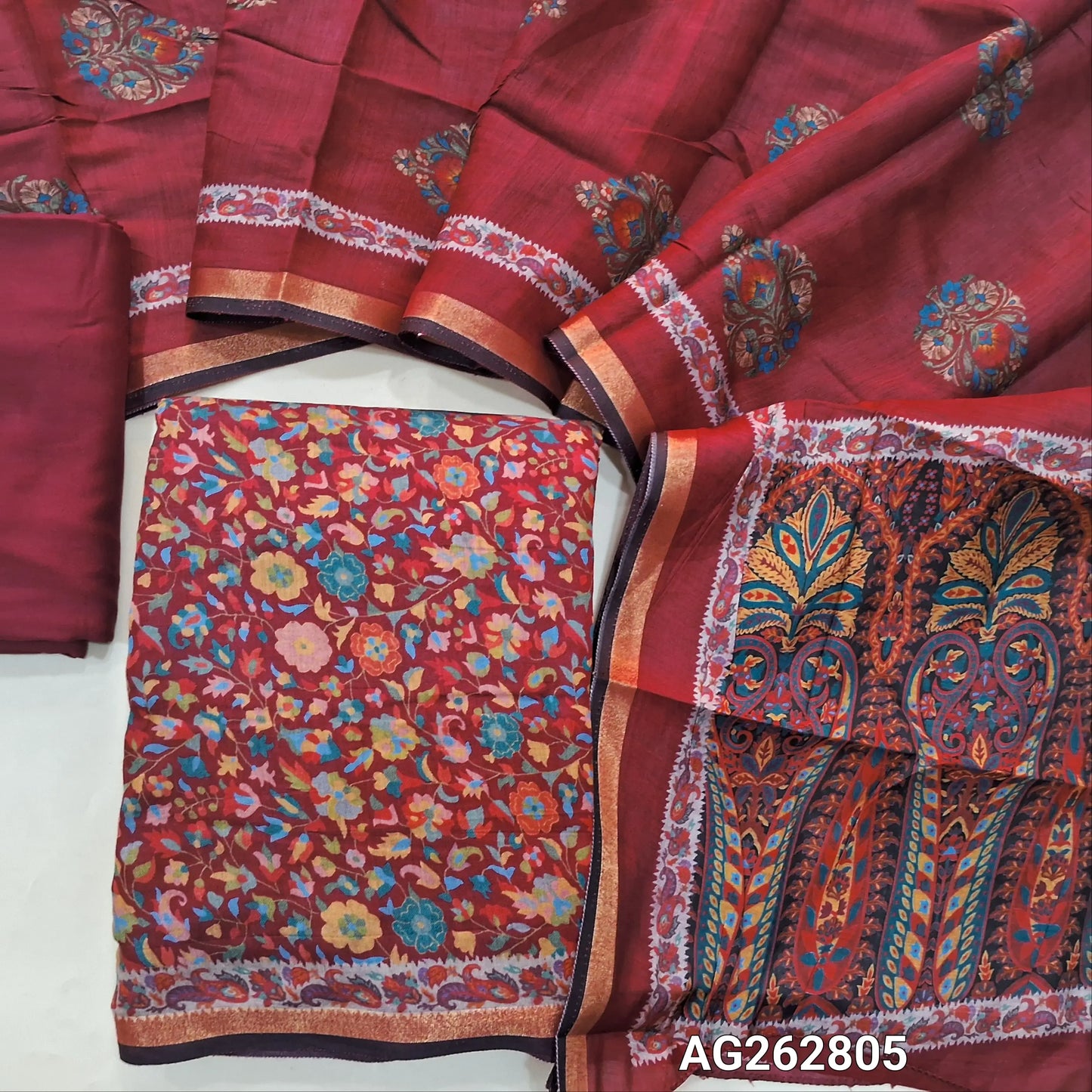 Reddish Maroon floral printed soft silk cotton unstitched salwar material, tissue borders on daman (Lining Needed) Matching spun cotton bottom, digital printed soft silk cotton dupatta with borders. AG262805
