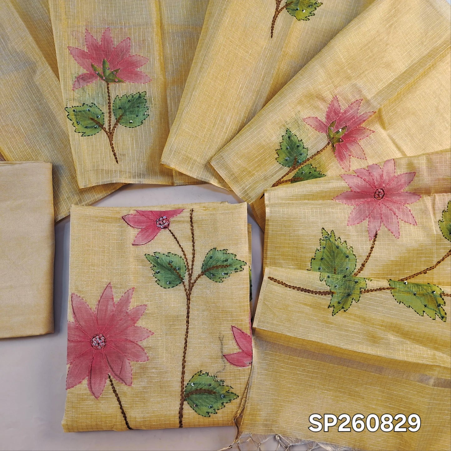 Designer pastel yellow golden tint tissue kota unstitched salwar material, floral design with hand brush paint, kantha stitch and sequins on front,(lining needed)santoon bottom,floral printed and brush paint on tissue kota dupatta. SP260829