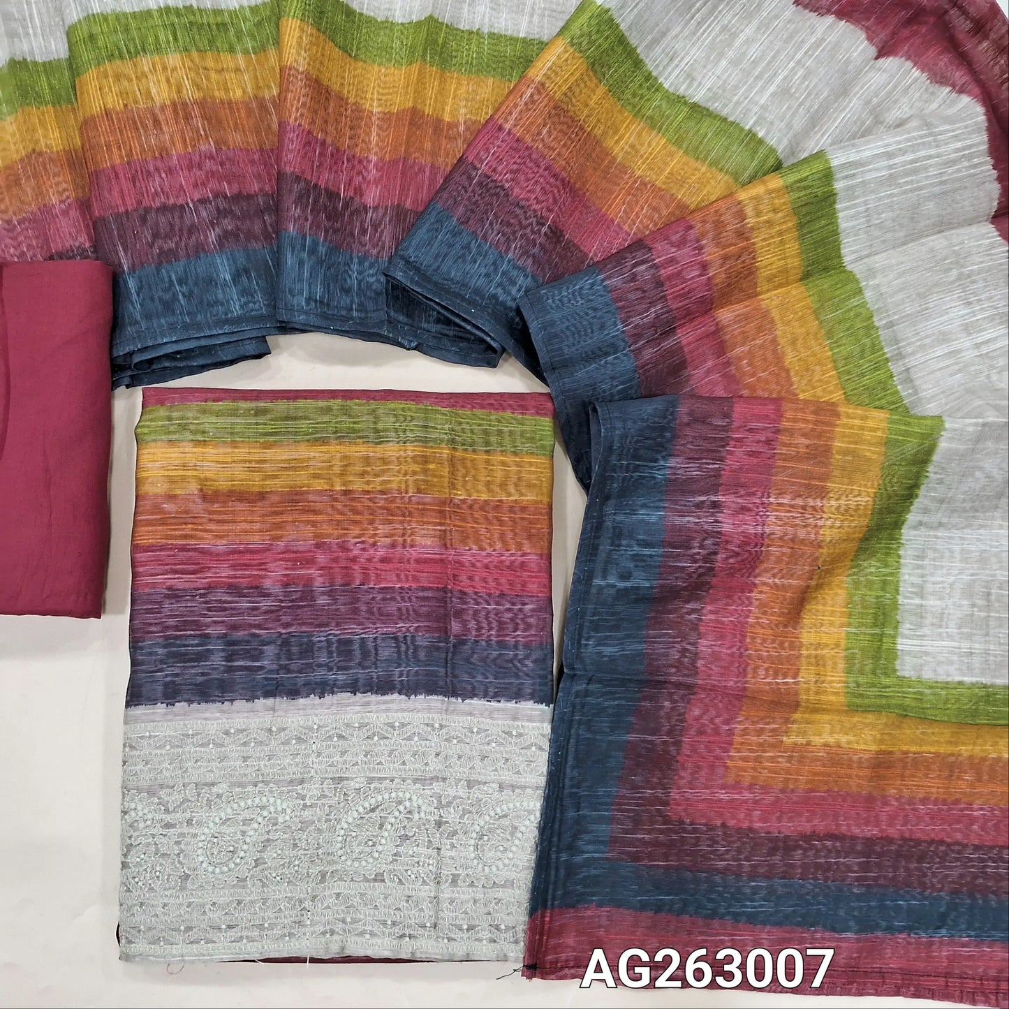 Maroon base multicolored slub silk cotton unstitched salwar material, embroidery on daman (Lightweight, Textured, Lining Needed) spun cotton bottom, multicolored spun silk cotton dupatta. AG263006