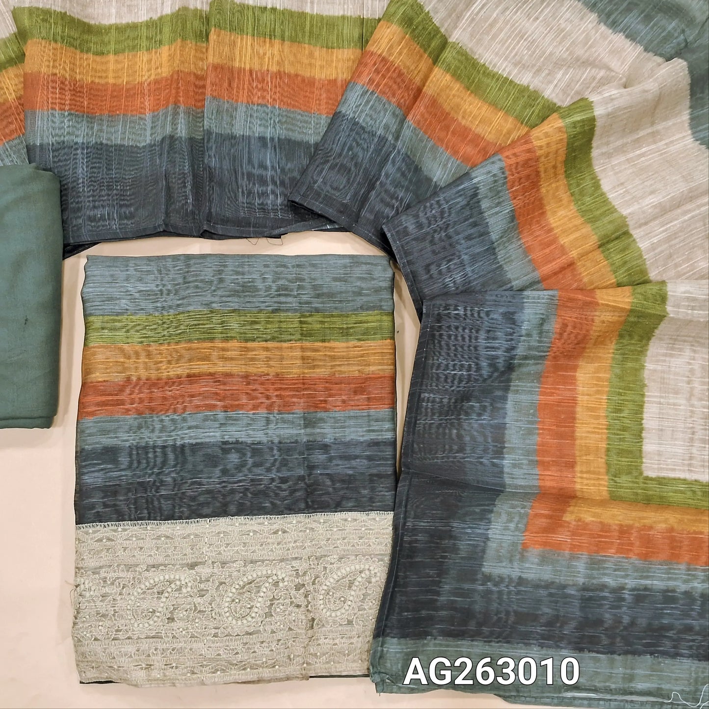 Grey base multicolored slub silk cotton unstitched salwar material, embroidery on daman (Lightweight, Textured, Lining Needed) spun cotton bottom, multicolored spun silk cotton dupatta. AG263009