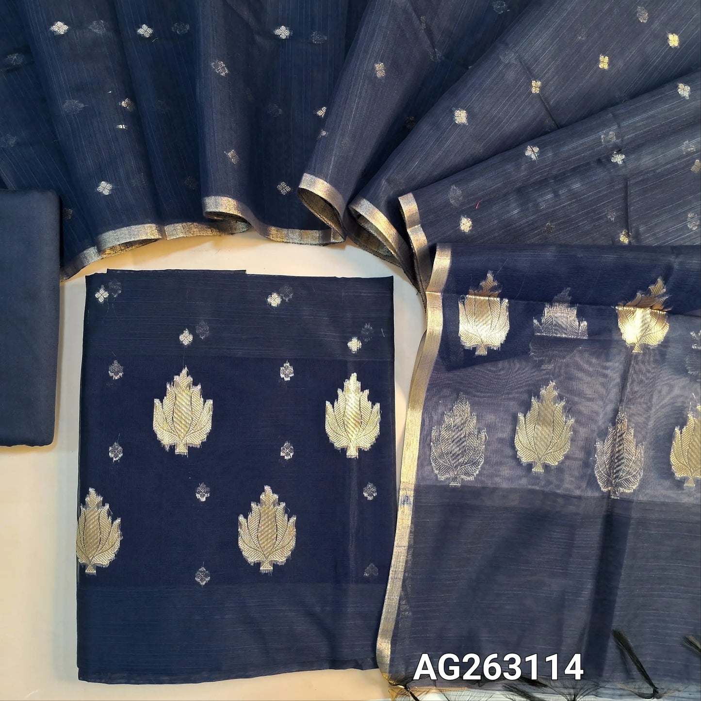 Dark Blue slub silk cotton unstitched salwar material, organza patch on daman, benarasi zari weaving all over (Lining Needed) Matching bottom, slub silk cotton dupatta with benarasi zari weaving. AG263114
