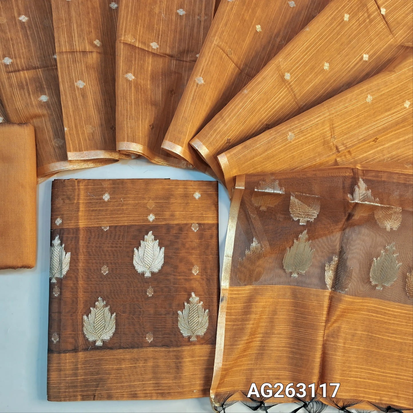 Honey Brown slub silk cotton unstitched salwar material, organza patch on daman, benarasi zari weaving all over (Lining Needed) Matching bottom, slub silk cotton dupatta with benarasi zari weaving. AG263117