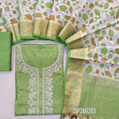 Leafy Green with golden tint tissue silk cotton unstitched salwar material, embroidery and zari thread weaving on yoke (Lining Needed) Matching Silky Bottom, digital printed tissue silk cotton dupatta with benarasi zari woven borders. SP260203