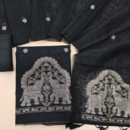 Black tussar unstitched salwar material with rich gold and silver jamdani weaving on yoke and daman (Thin, Lining Needed) Matching  santoon Bottom, jamdani woven tussar dupatta with handmade tassels. SP260216