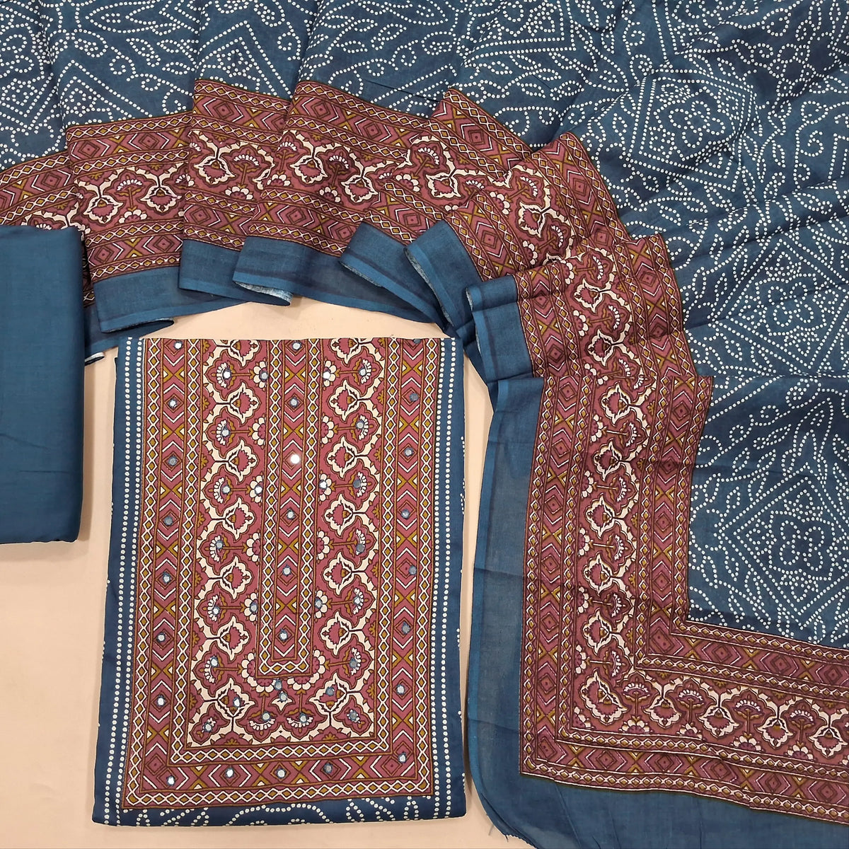 Blue with pink bandhini printed soft cotton unstitched salwar material, printed contrast yoke and daman (Lining Needed0matching spun cotton bottom, diital printed soft mul cotton dupatta. SP260630
