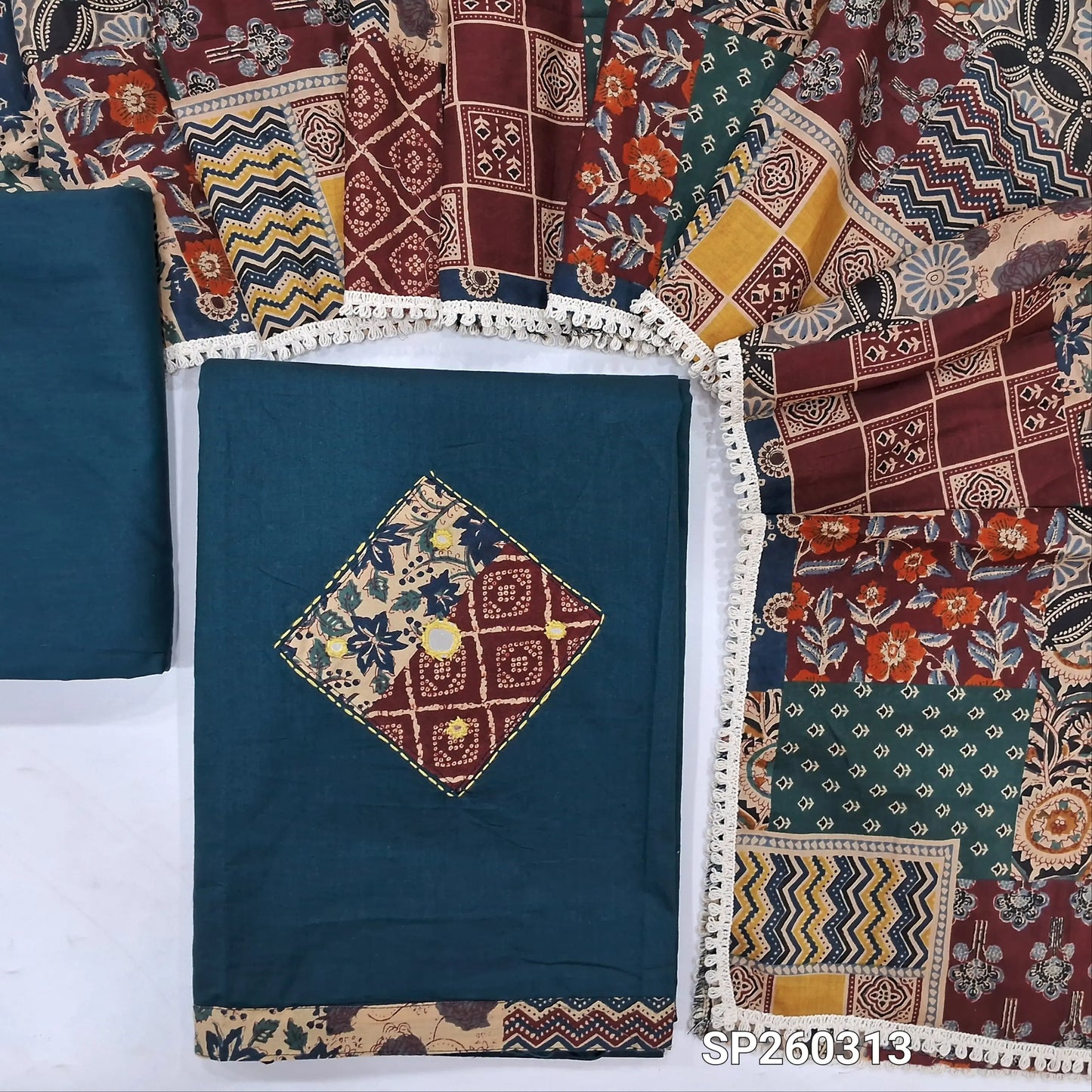 Dark Teal Blue designer dabu cotton unstitched salwar material, applique and mirror work on yoke and daman (Lining Optional) matching bottom, printed mul cotton dupatta, printed dabu cotton over coat. SP260313