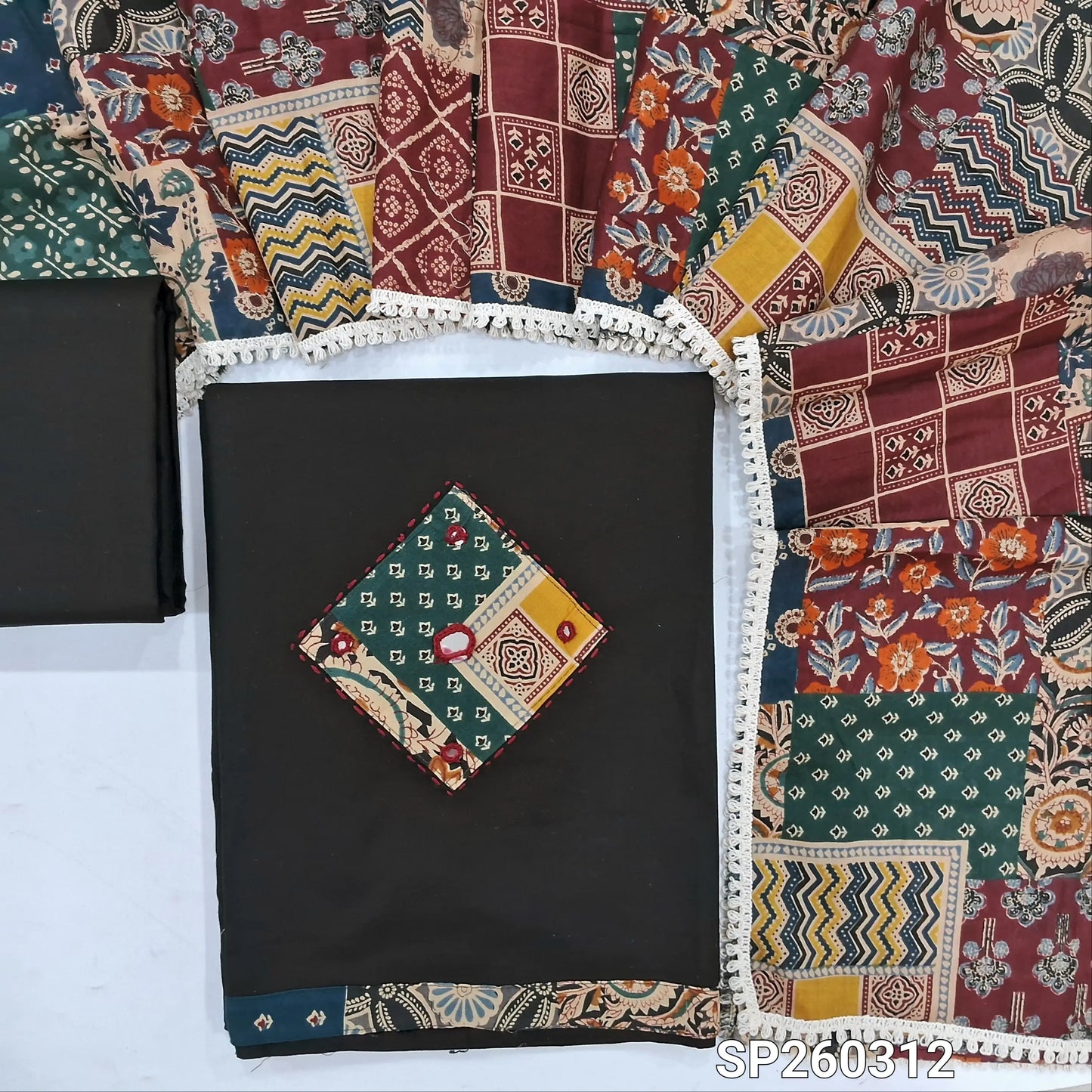 Black designer dabu cotton unstitched salwar material, applique and mirror work on yoke and daman (Lining Optional) matching bottom, printed mul cotton dupatta, printed dabu cotton over coat. SP260312