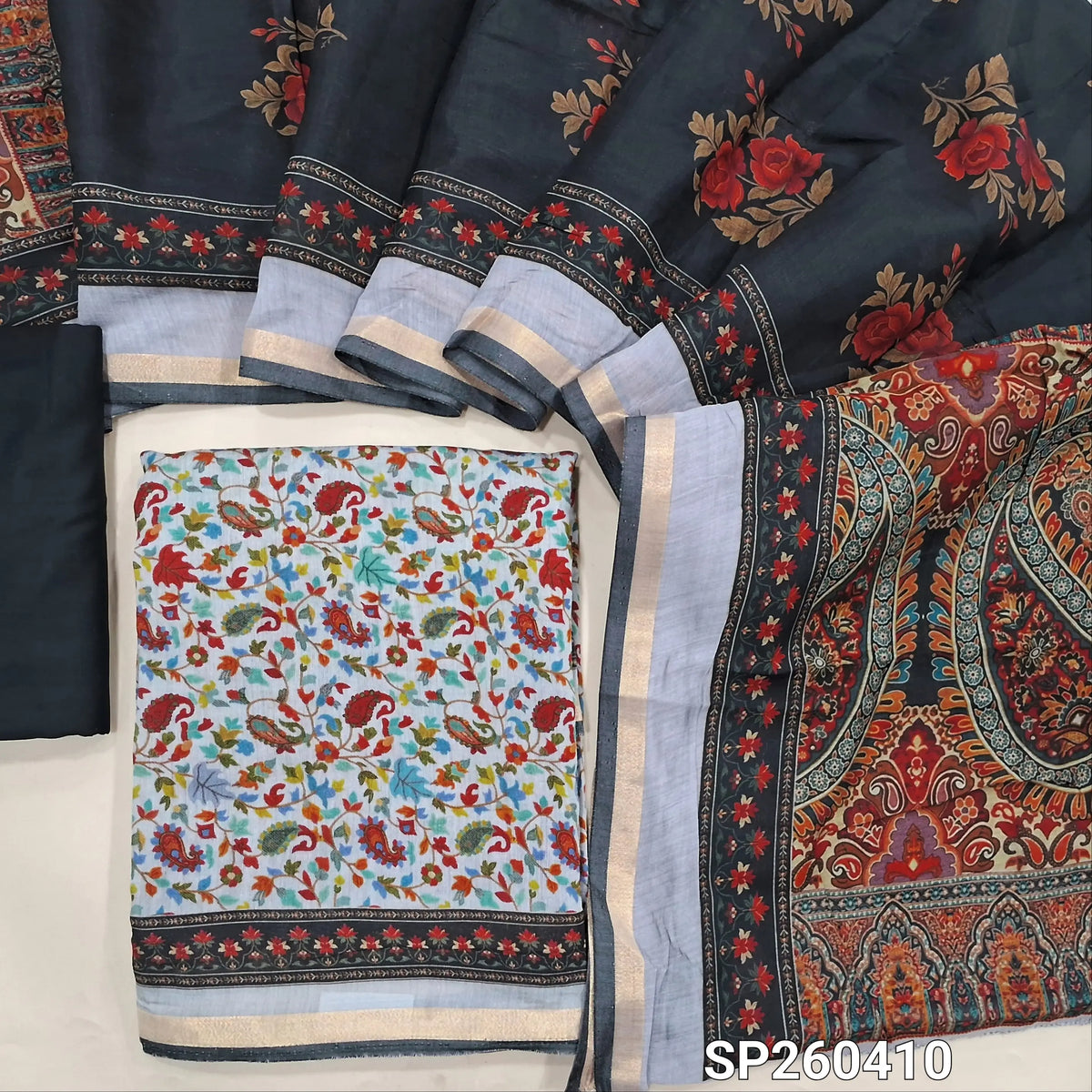 Silver grey floral printed soft silk cotton unstitched salwar material, tissue borders on daman (Lining Needed) Matching spun cotton bottom, digital printed soft silk cotton dupatta with borders. SP260410