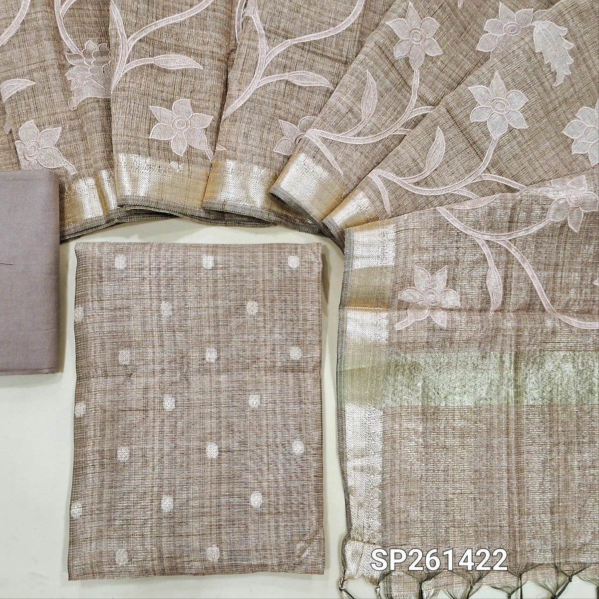 Onion pink with golden tint tissue silk cotton untitched salwar material, zari buttas on front (Textured, Lining Needed)matching spun cotton bottom, tissue silk cotton dupatta with applique work zari woven borders and pallu. SP261422