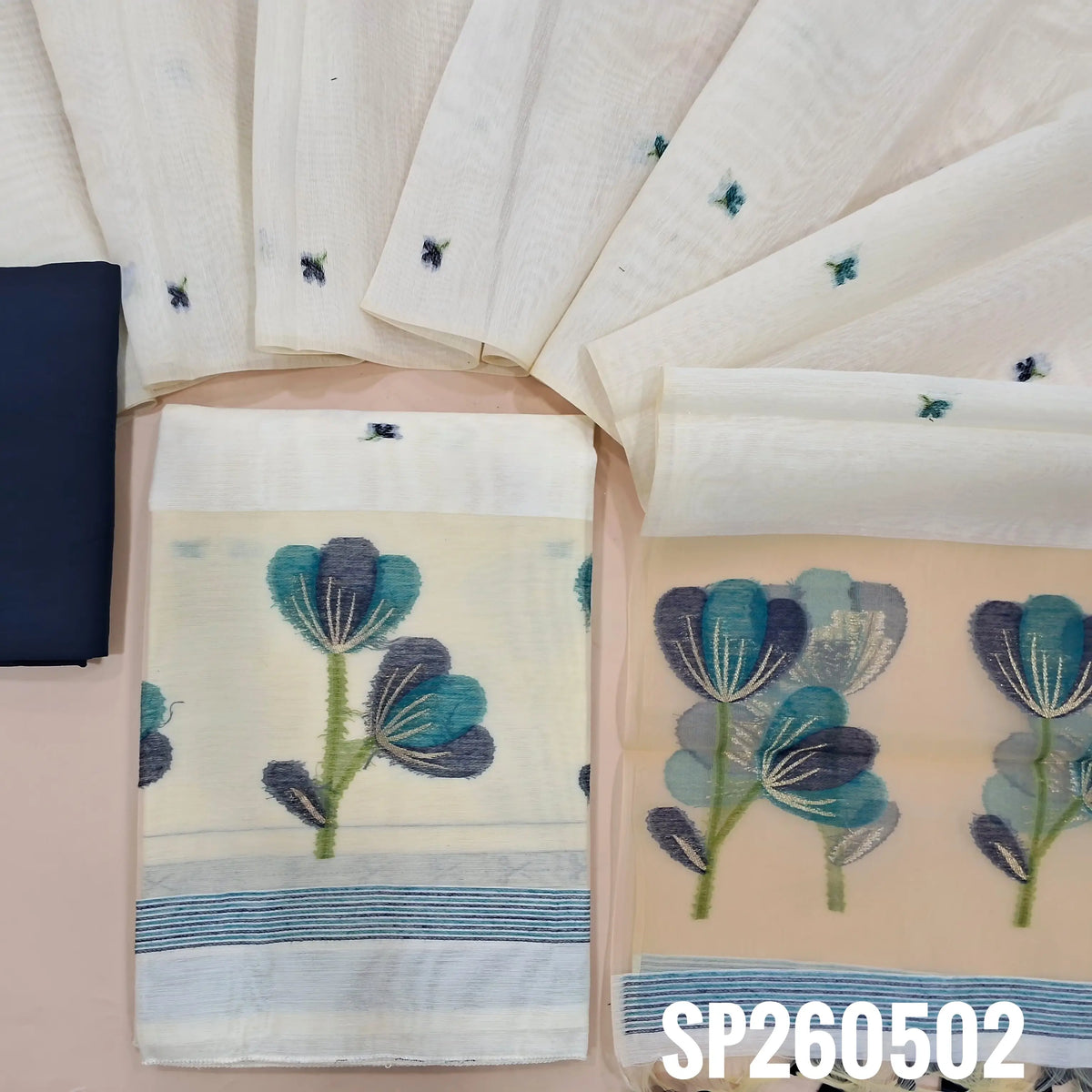 Off white designer silk cotton unstitched salwar material, jamdani weaving all over, organza daman with jamdani weaving (Thin, Lining Needed) Blue santoon bottom, jamdani woven silk cotton dupatta with organza pallu and tassels. SP260502