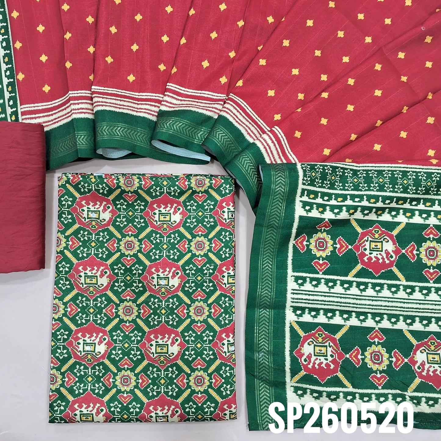 Green and red patola printed semi tussar unstitched salwar material (Silky, Lining Needed)matching silky bottom, patola printed semi tussar dupatta. SP260520