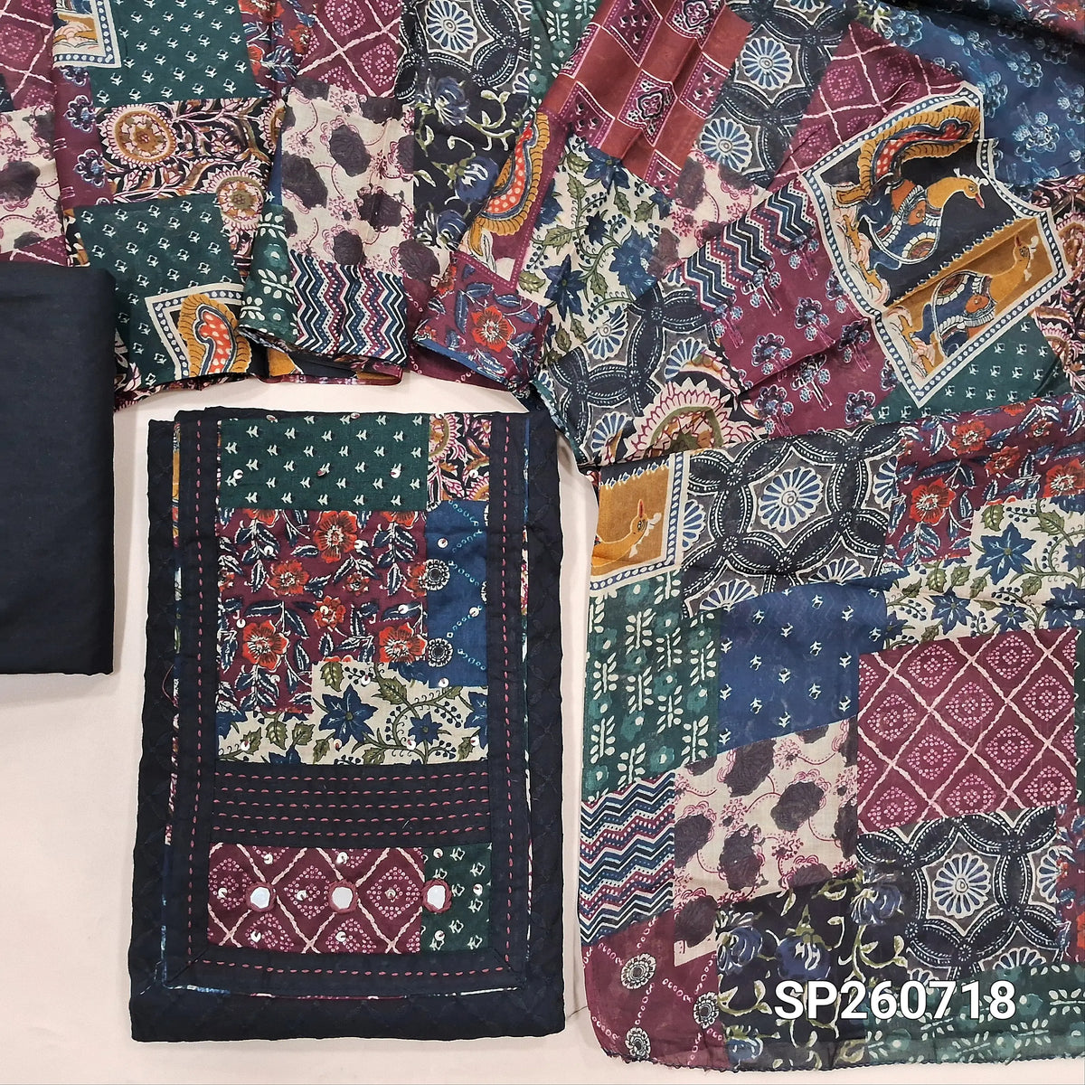 Black soft cotton unstitched salwar material, embroidery work all over, printed yoke with real mirror and kantha stitch detailing (Lining Needed) matching cotton bottom, printed soft mixed cotton dupatta. SP260718