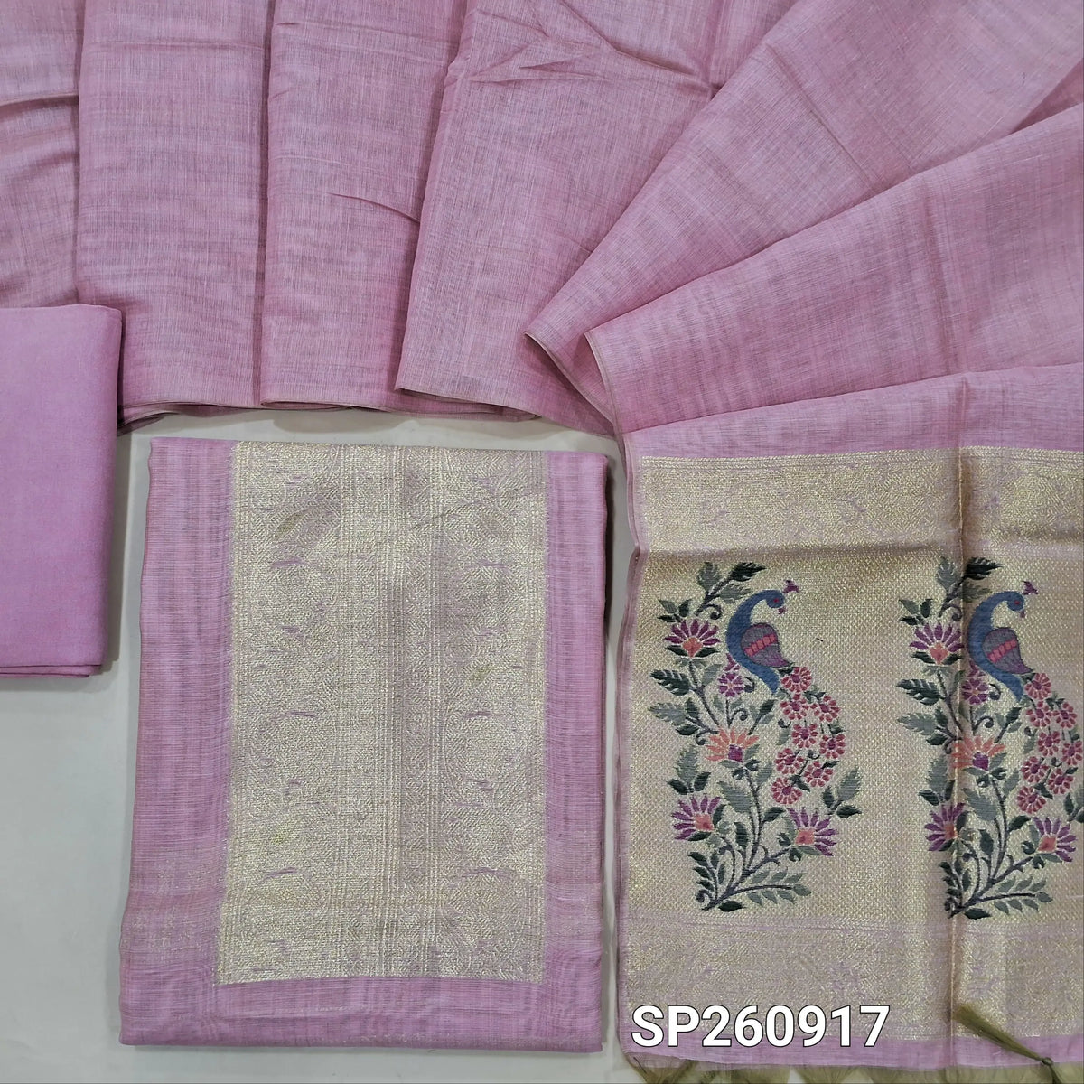 Pastel pink soft silk cotton unstitched salwar material,benarasi zari weaving on yoke and front, rich daman (Thin, Lining Needed)matching santoon bottom, zari woven silk cotton dupatta. SP260917