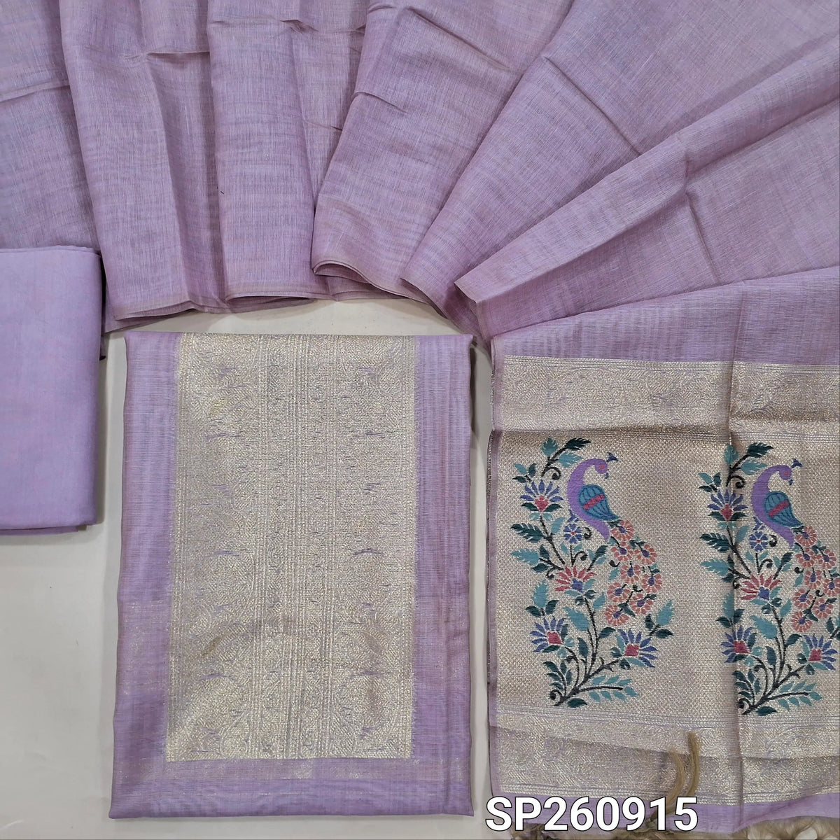 Lavender soft silk cotton unstitched salwar material,benarasi zari weaving on yoke and front, rich daman (Thin, Lining Needed)matching santoon bottom, zari woven silk cotton dupatta. SP260915