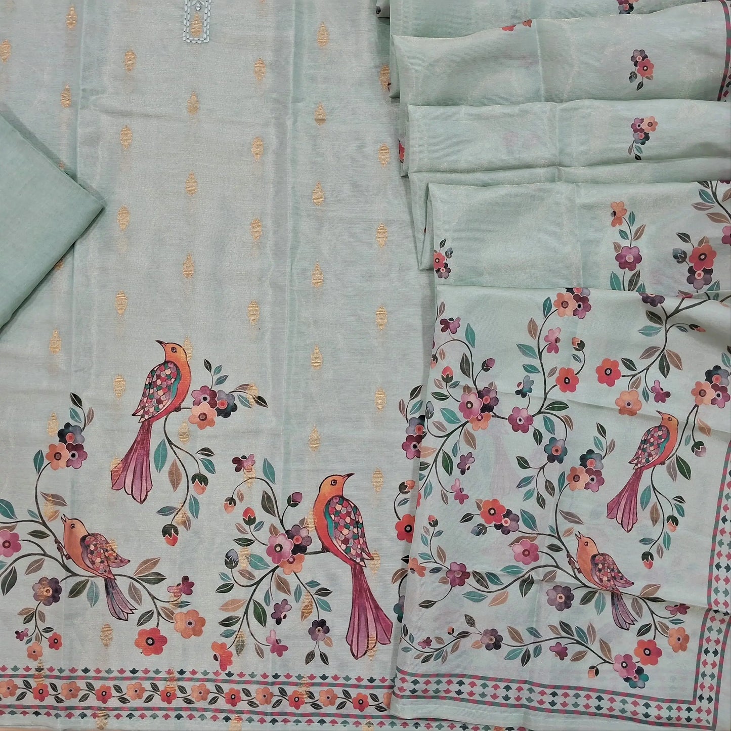 Pastel blue benarasi tissue silk cotton unstitched salwar material, real mirror work on yoke, digital printed (Textured, Linig Needed)matching santoon bottom, printed tissue silk cotton dupatta. SP260911