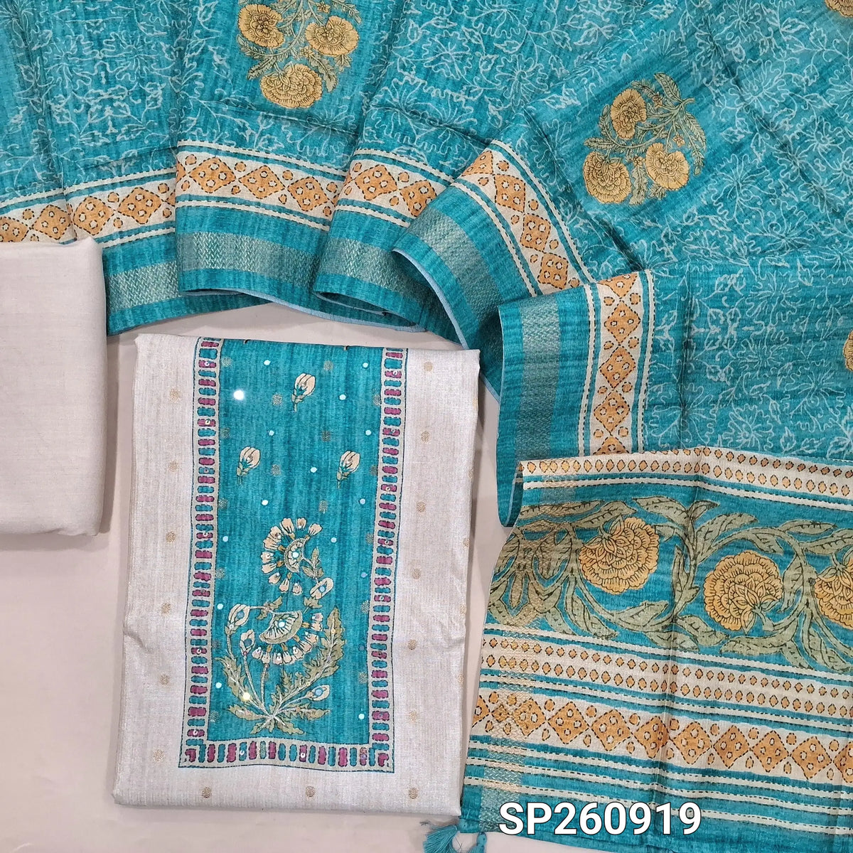 Beige and blue premium tussar silk unstitched salwar material, zari buttas on front, contrast yoke (Lightweight, Lining Needed)matching spun cottob bottom, digital printed premium tussar dupatta. SP260919