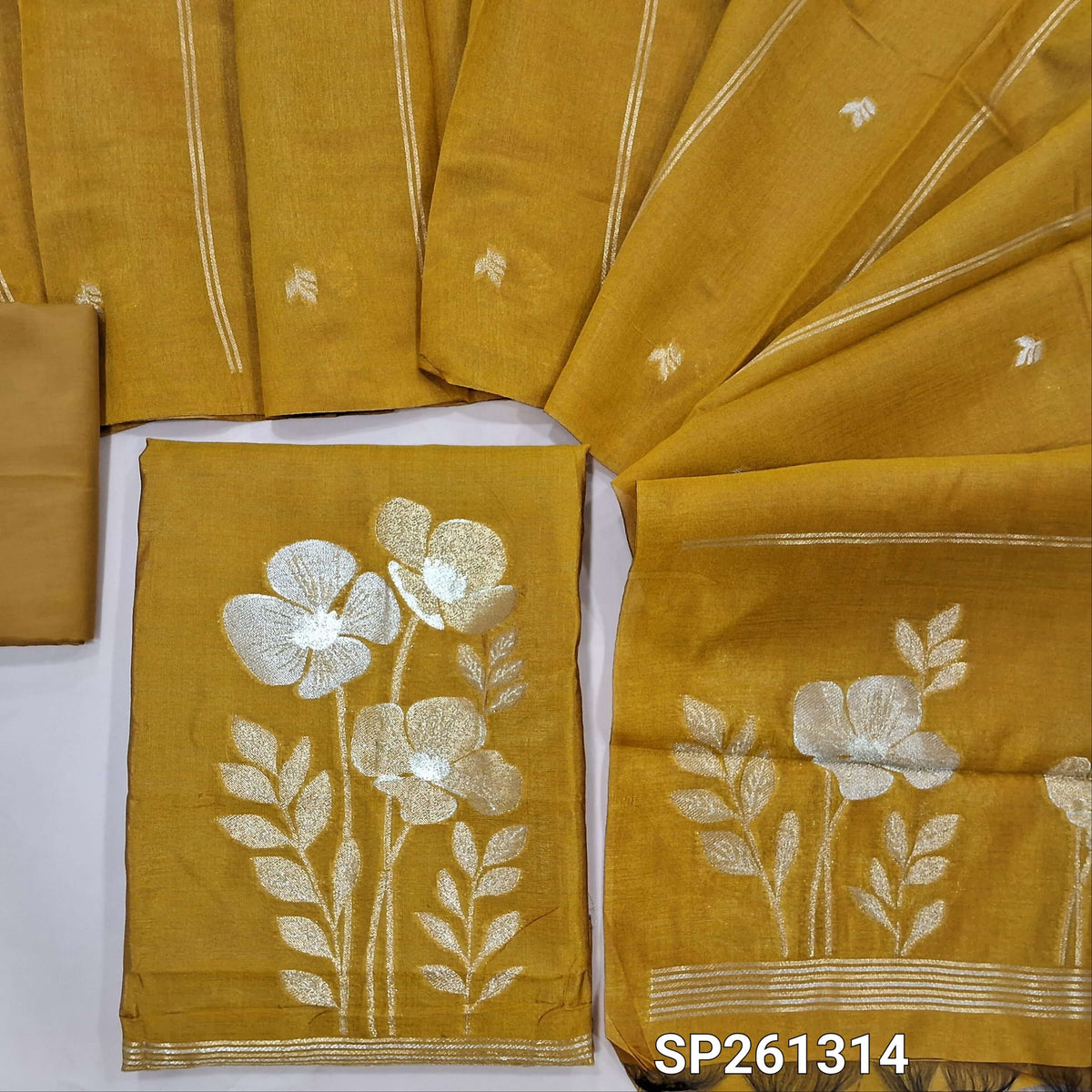 Mehandhi yellow silk cotton unstitched salwar material, silver and gold zari weaving on daman anf ront (Thin, Lining Needed)matching silky bottom, silk cotton dupatta with zari weaving. SP261314