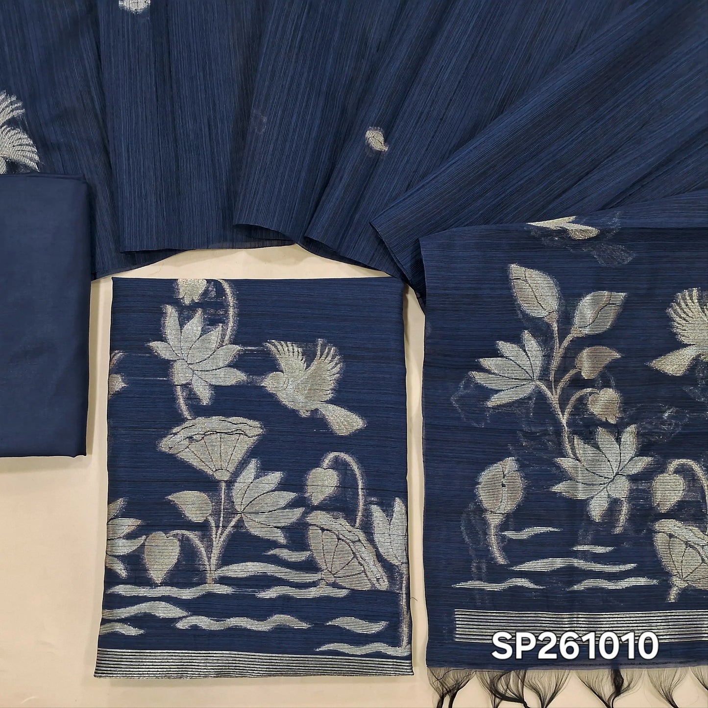 Dark blue semi tussar unstitched salwar material, gold and silver zari weaving on front (Textured, Lining Needed)matching silky bottom, semi tussar dupatta with rich weaving. SP261010