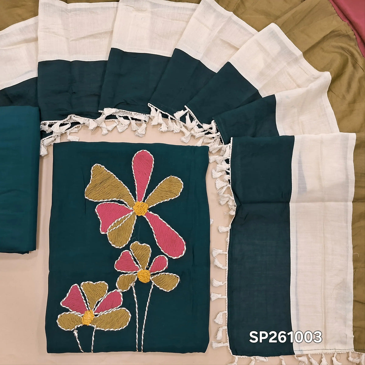 Dark teal blue mul chanderi unstitched salwar material with rich hand embroidery ondaman and yoke (Thin, Lining Needed)matching silky bottom,mul chanderi multicolored dupatta. SP261003