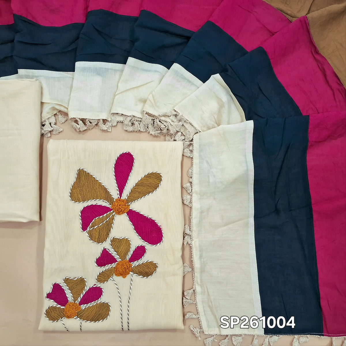 Off white mul chanderi unstitched salwar material with rich hand embroidery ondaman and yoke (Thin, Lining Needed)matching silky bottom,mul chanderi multicolored dupatta. SP261004