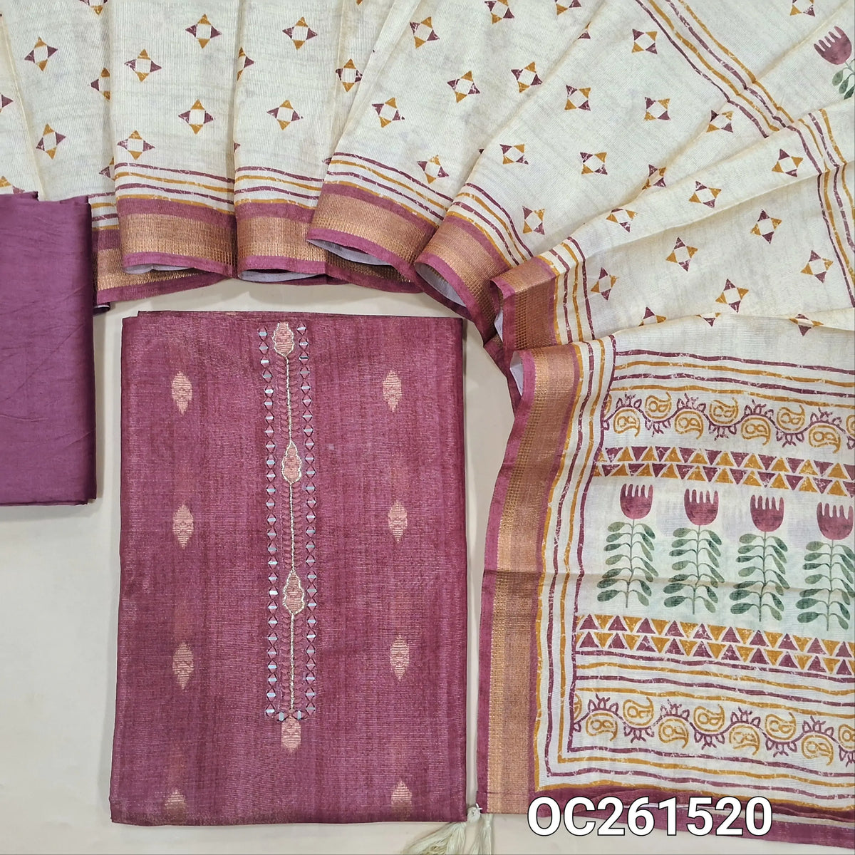 Beetroot purple with golden tint tissue silk cotton unstitched salwar material, real mirror yoke, copper zari buttas all over,(lining needed)silky bottom, digital printed soft tissue silk cotton dupatta with zari borders. OC261520