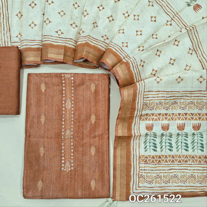 Brick red with golden tint tissue silk cotton unstitched salwar material, real mirror yoke, copper zari buttas all over,(lining needed)silky bottom, digital printed soft tissue silk cotton dupatta with zari borders. OC261522