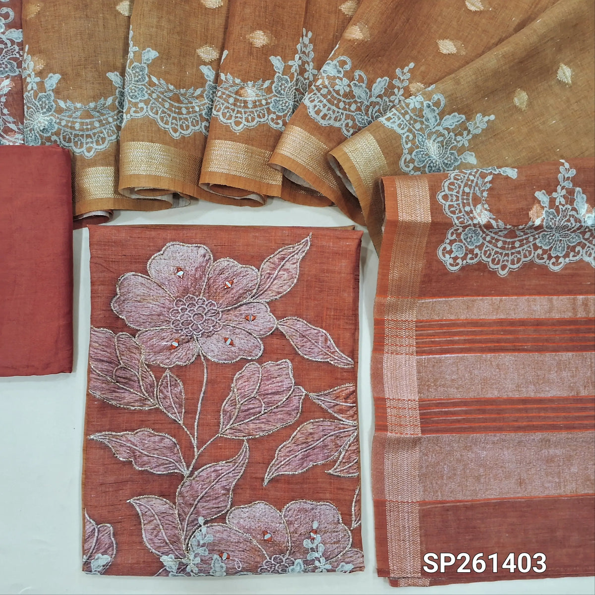 Brick red dual shaded premium semi linen unstitched salwar material, digital prints wirh embroidery and real mirror work (Textured, Lining Needed)matching santoon bottom, digital printed premium semi linen dupatta with zari buttas. SP261403