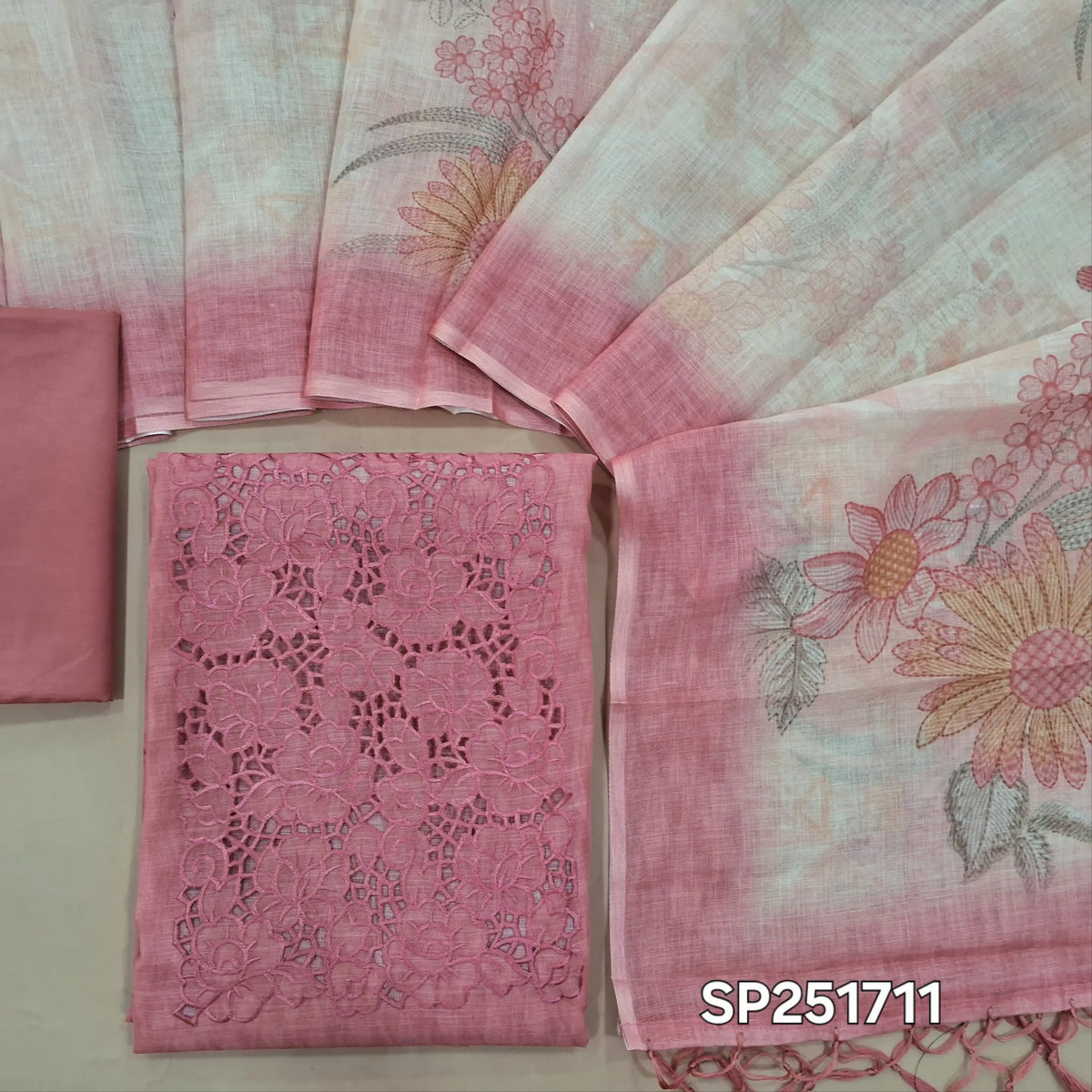 Pastel pink linen unstitched salwar material, cutwork on yoke with thread embroidery (Thin, Lining Needed)matching silky bottom, semi linen digital printed dupatta with tassels. SP261711
