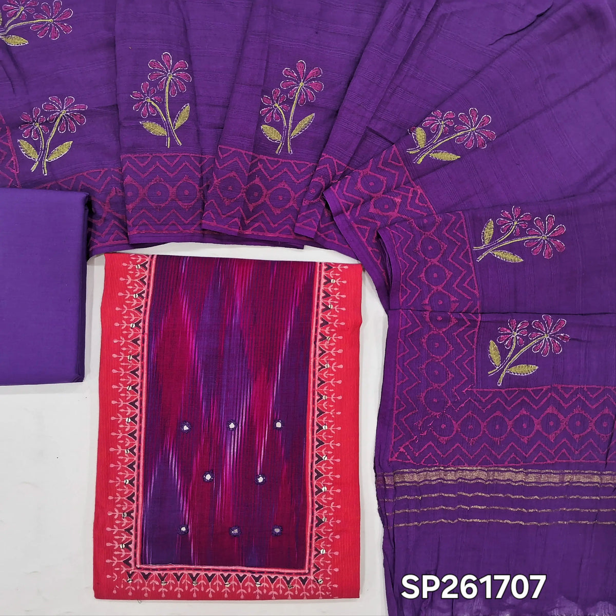Pink with purple handloom cotton unstitched salwar material, hand block prints on front, real mirror and ikat yoke patch (Lining Optional)pure cotton bottom, mul cotton dupatta with hand block prints and zari detailing. SP261707