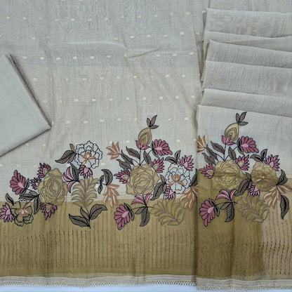 Rich beige premium silk cotton unstitched salwar material, zari buttas on front, applique work, thread embroidery and gold tissue daman,(lining needed)spun cotton bottom,silk cotton dupatta with applique and tissue pallu and lace tapping. SP261812