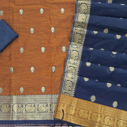 Honey brown premium silk cotton unstitched salwar material,buttas all over benarasi zari weaving daman, (lining needed)dark blue silky bottom,buttas on silk cotton dupatta with pallu and borders. SP261807