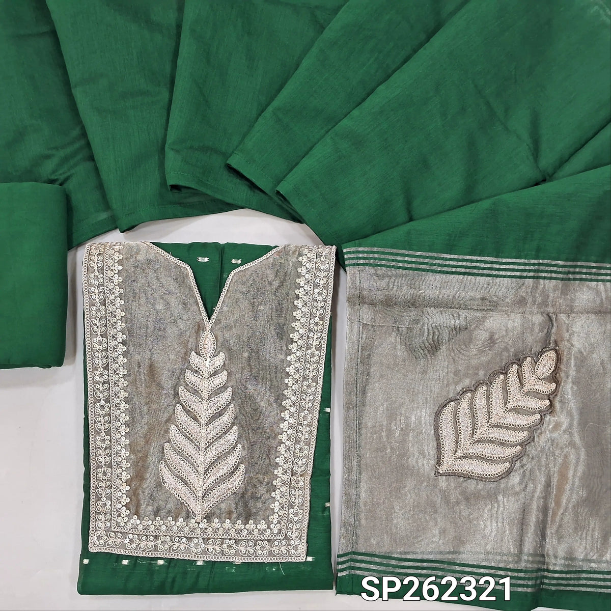 Designer dark green silk cotton unstitched salwar material, gold tissue and daman with embroidery, zari buttas (Thin, Lining Needed)matching spun cotton bottom, silk cotton dupatta with tissue and embroidery on pallu. SP262321