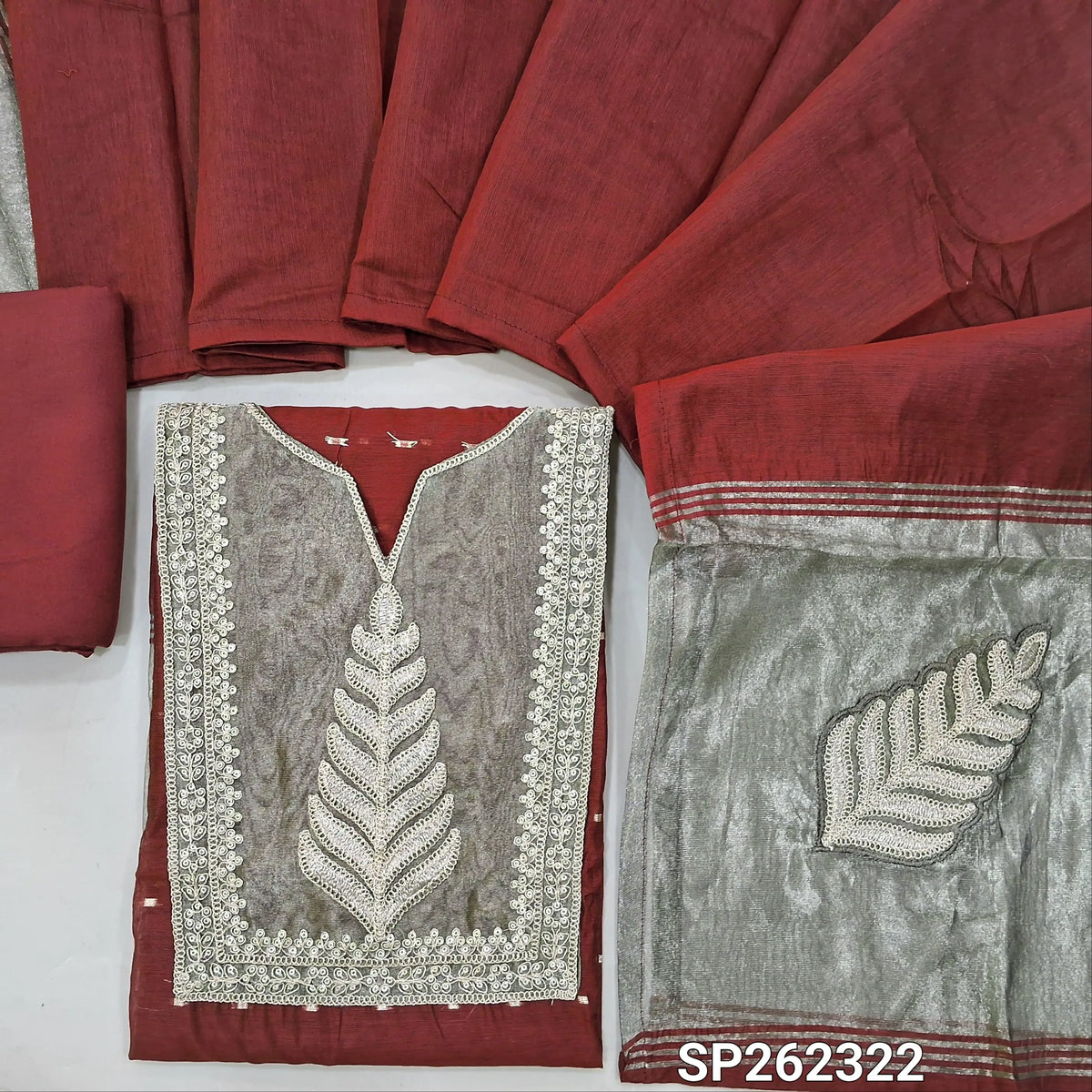 Designer dark maroon silk cotton unstitched salwar material, gold tissue and daman with embroidery, zari buttas (Thin, Lining Needed)matching spun cotton bottom, silk cotton dupatta with tissue and embroidery on pallu. SP262322