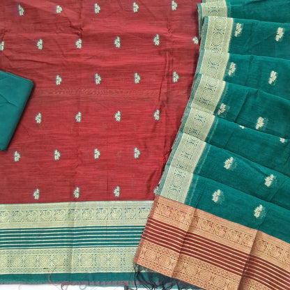 Maroon premium silk cotton unstitched salwar material,buttas all over benarasi zari weaving daman, (lining needed)teal green silky bottom,buttas on silk cotton dupatta with contrast pallu and borders. SP262207