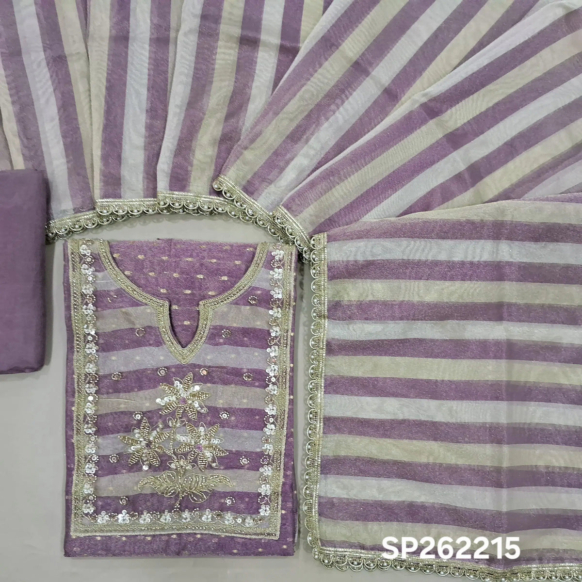 Mauve with golden tint tissue organza unstitched salwar material,round notch neck with sugar bead,pearl bead sequins& zarodsi, buttas all over,(lining needed)silky bottom, silver & antic gold zari work ontissue organza dupatta bead lace work. SP262215