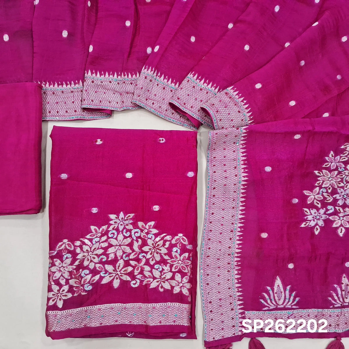 Rani pink jakard dola silk unstitched salwar material,self woven design& antic gold zari buttas, weaving with hand embroidery daman& yoke,(Lining Needed)silk bottom, jakard dola silk dupatta with rich weaving pallu and embroidery borders. SP262202