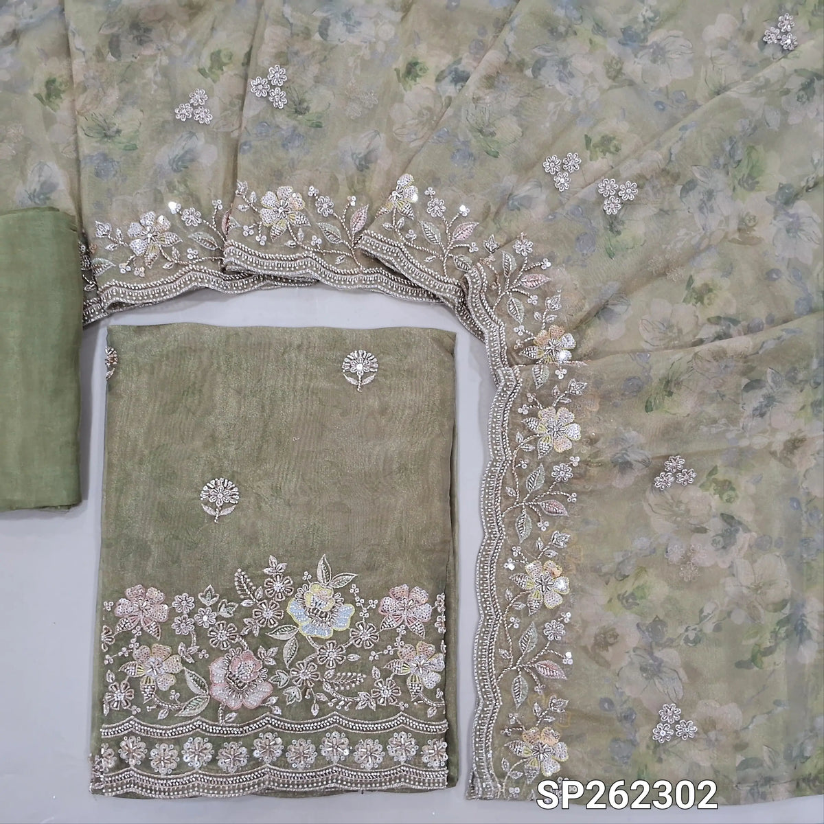 Sage green pure tissue organza silk digital printed unstitched salwar material, rich zardosi, cut bead ad sequins detailing on front and daman (Thin, Lining Needed)matching santoon bottom,dupatta with digital prints and rich bead detailing. SP262302