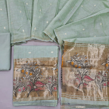 Sea green lightweight silk cotton unstitched salwar material, zari weaving all over. gold tissue daman(Thin, Lining Needed)matching silky bottom, silk cotton dupatta with tissue pallu. SP262318