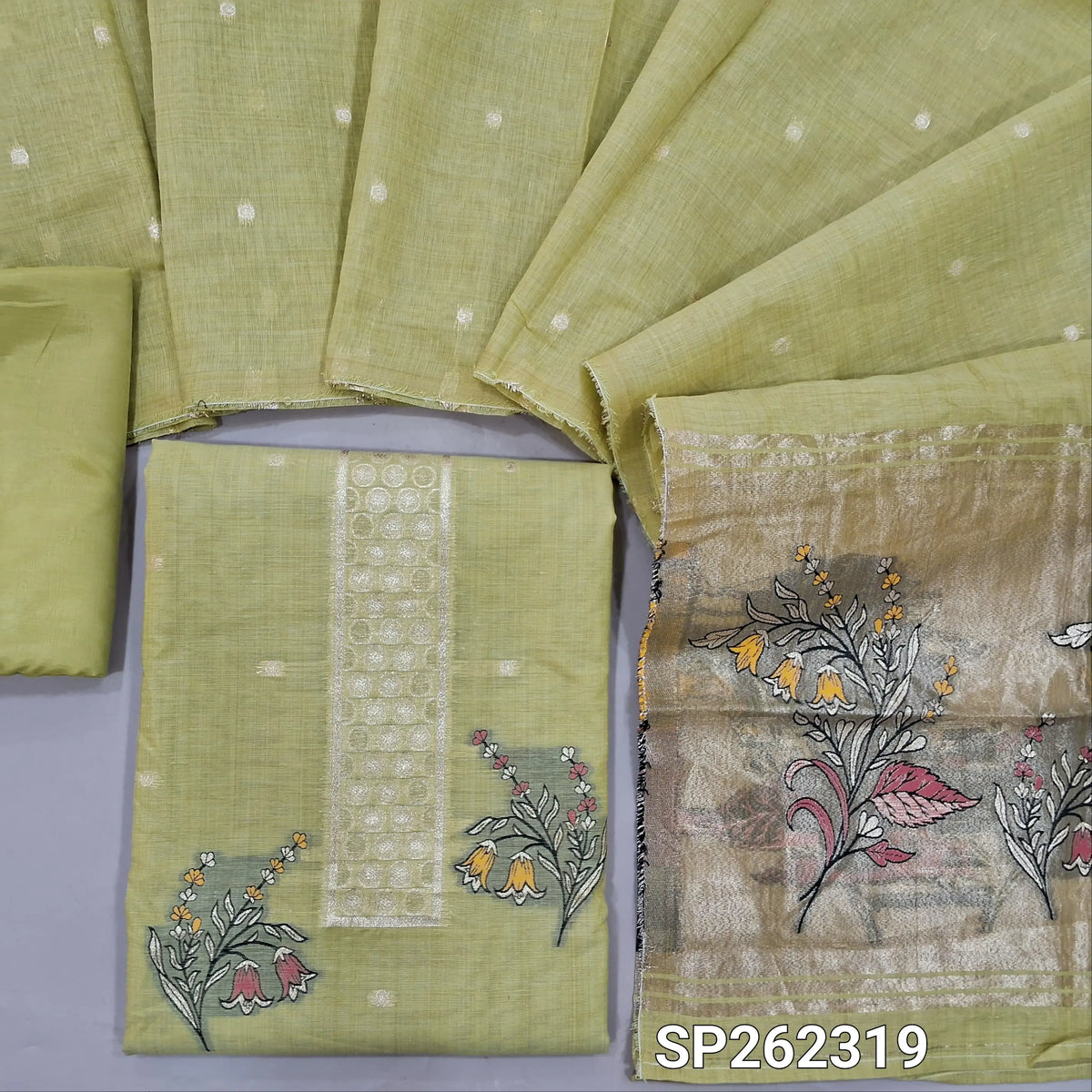 Light mehandhi green lightweight silk cotton unstitched salwar material, zari weaving all over. gold tissue daman(Thin, Lining Needed)matching silky bottom, silk cotton dupatta with tissue pallu. SP262319