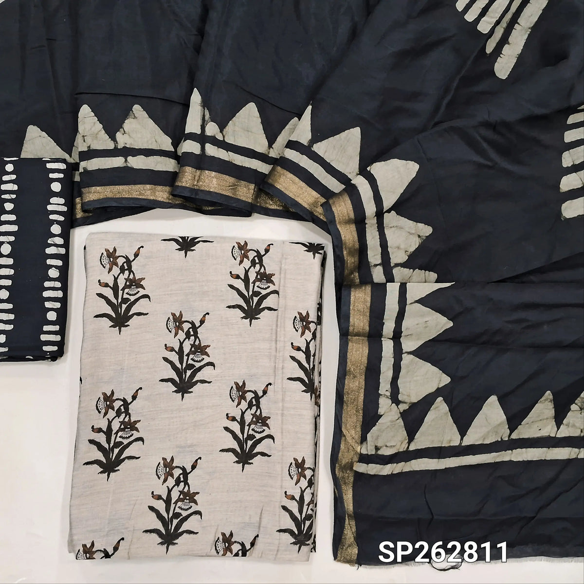 Greyish beige base printed silk cotton unstitched salwar material,(lining needed)black batik dyed cotton bottom,batik dyed silk cotton dupatta(TAPPING NEEDED). SP262811