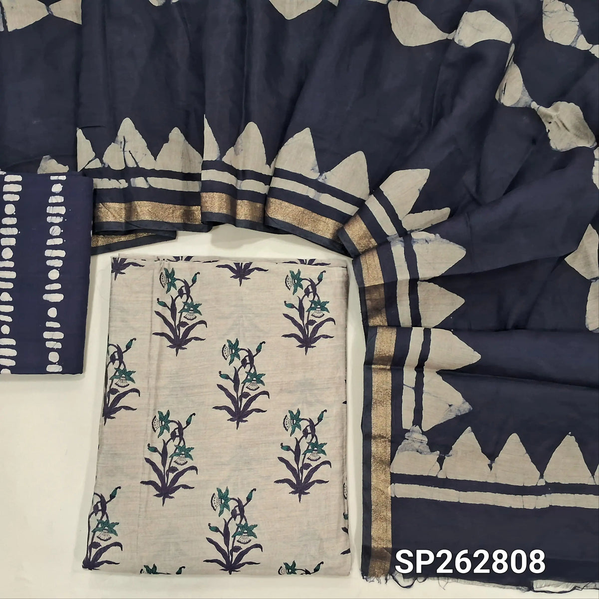 Greyish beige base printed silk cotton unstitched salwar material,(lining needed)dark blue batik dyed cotton bottom,batik dyed silk cotton dupatta(TAPPING NEEDED). SP262808