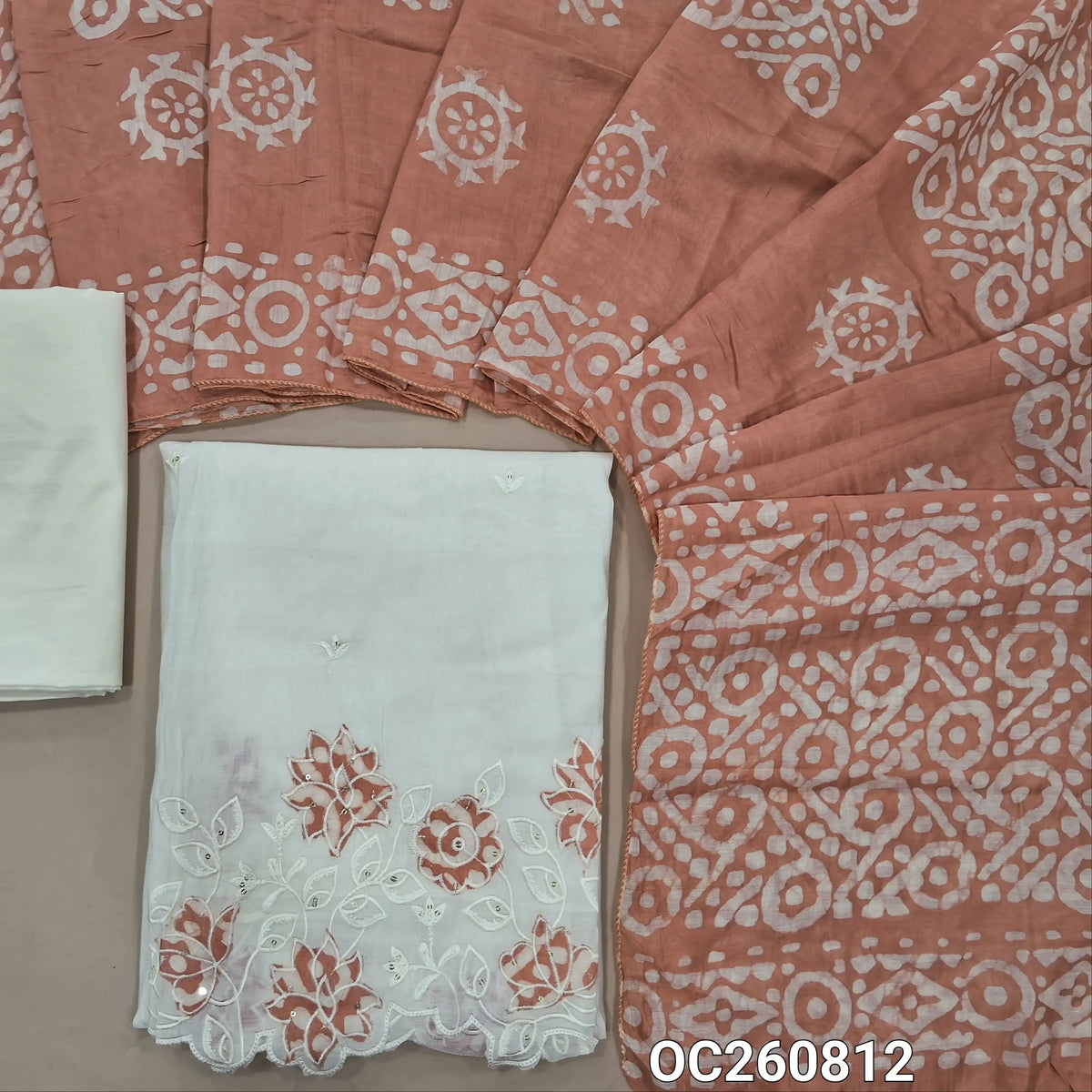 Off white base mul chanderi unstitched salwar material, embroidery on front, applique & embroidery with cutwork daman, (Lining Needed) silky bottom, (PEACH)batik design on soft silk cotton dupatta. OC260812