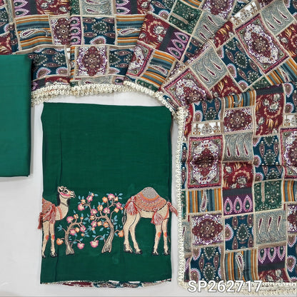 Dark teal green mul chanderi unstitched salwar material,printed taping & tassles on yoke,camel design with embroidery work on daman,( lining needed)silk cotton bottom, multicoloured digital printed crinkled chinon silk dupatta with lace tapping. SP262717
