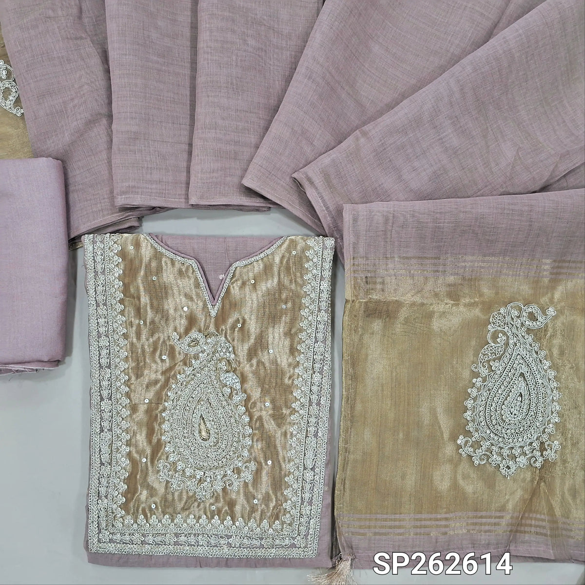 Mauve silk cotton unstitched salwar material,tissue fabric on yoke with zarodzi and sequins work, zari buttas all over,(Thin, Lining Needed)spun cotton bottom,silk cotton dupatta with rich pallu. SP262614